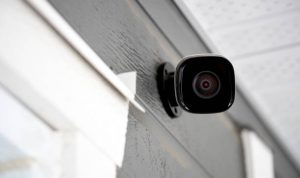Black cctv outside the building, home security system